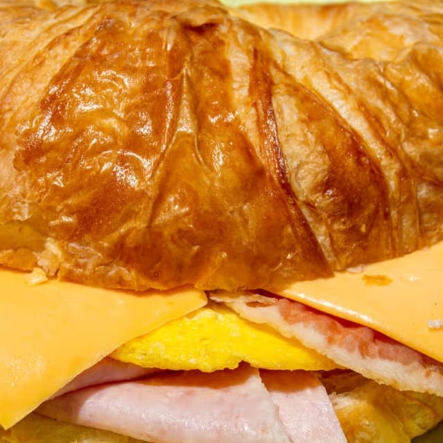 Toast Bread with Ham, Egg, Bacon, Cheese and Mayo.